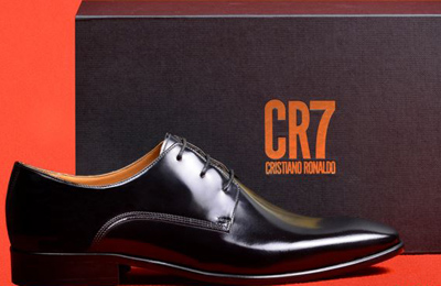 Cristiano Ronaldo unveils new sparkling football CR7 boots .